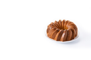 Traditional bundt cake with raisins isolated on white background. Copy space