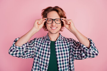 Close-up portrait of cheerful guy happy positive smile eyewear oculist isolated over pink color background