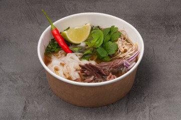 fo bo soup with beef in a craft dish