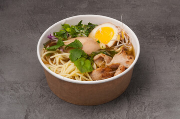 ramen soup with beef in a craft dish