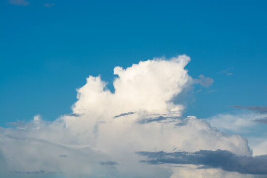 White fluffy Cloud with Beautiful blue sky as Background