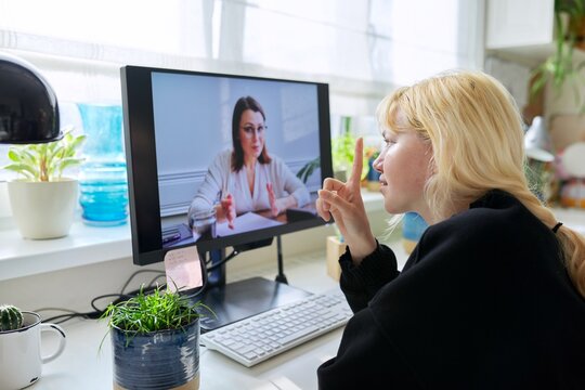 Online session of a psychologist, counselor with a female teenager