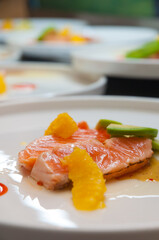 tasty salmon with avocado and orange. close-up.