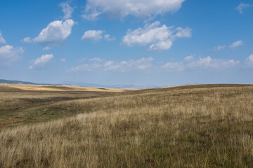 Curvy hills and Blue sky and. Beautiful plain. Montenegro
