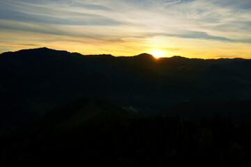 Silhouette of mountain landscape at sunset. Drone photography