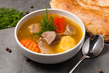 shurpa is a traditional Uzbek soup with lamb