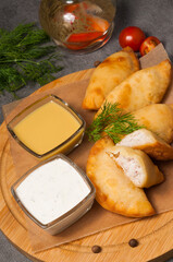 posekunchiki - small pies with meat, with mustard dressing and sour cream