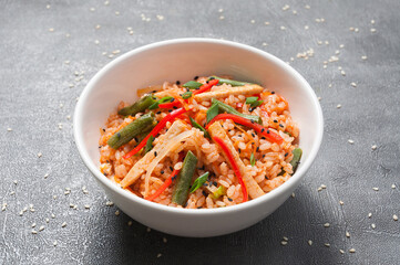 garlic rice with chicken and vegetables. asian cuisine