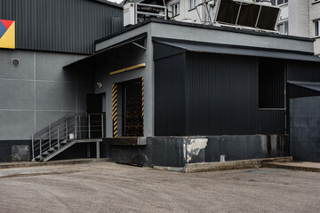The warehouse building of metal door.