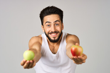 bearded man fresh fruit apples vitamins studio lifestyle