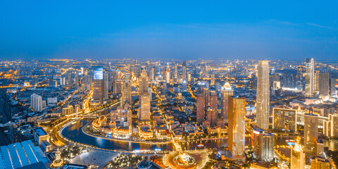 Fototapeta premium Aerial photography of Tianjin Jinwan Square and Century Clock CBD city skyline at night, China