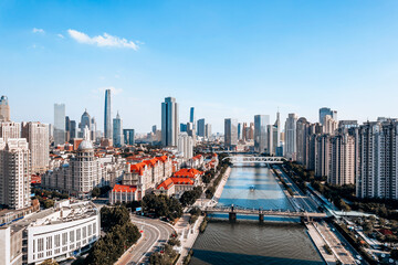 Aerial photography of the city skyline in the Olympic style district of Jintang Bridge, Haihe River, Tianjin, China
