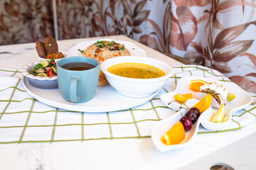 soup with chicken broth, tortillas and salad