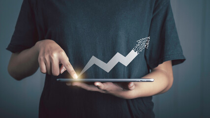 Businessman using tablet and touch arrow of growth connect line circuit digital transformation concept.