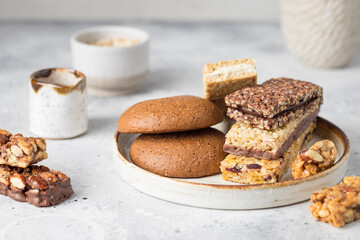 Energy protein bars in ceramic plate. Healthy sweet dessert snack