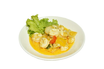 spicy fried squid with onion in egg and curry on plate