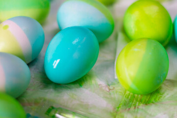 Fototapeta na wymiar Easter blue and green eggs after coloring with dyes for the Easter holiday