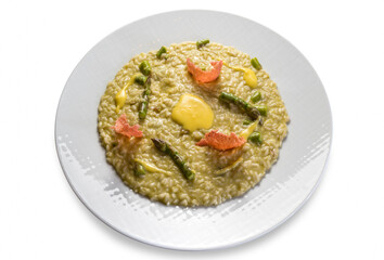 Risotto with asparagus in white dish isolated on white background, Italian rice gourmet recipe