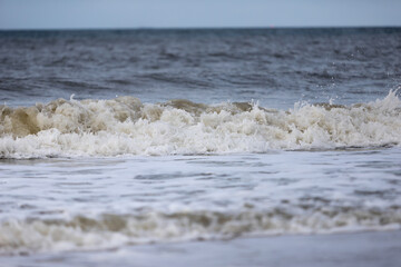 Waves of the North Sea on the beach