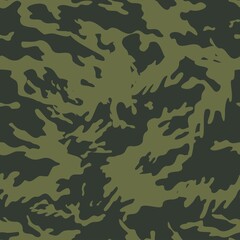 Fototapeta premium green camouflage pattern, military woodland design, army uniform.