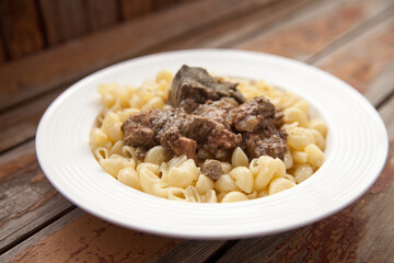Delicious pasta with stewed chicken liver