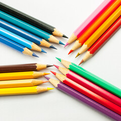 Pencils group . brightly colored pencils placed creatively on a white background.concept art design copy space school and office.