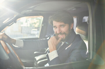 bearded man Driving a car trip luxury lifestyle self confidence