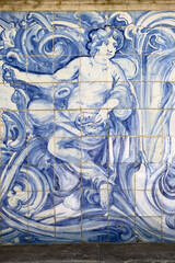 Fototapeta na wymiar Azulejos panels in the gardens of a palace in Estoi, Algarve, Portugal