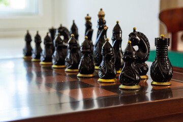 the concept of the game, chess pieces on the table
