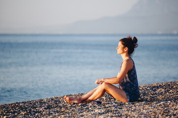 Young woman holding laptop computer on a beach. Freelance work, vacations, distance work, social distancing, e-learning, connection, creative professional, new business, meeting online concept