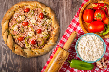 Delicious rustic pizza top view.