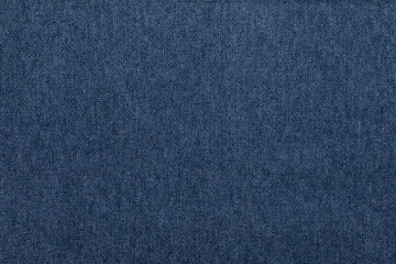 Fototapeta na wymiar Dark blue melange knitted fabric made of heather mixed yarn textured background