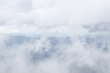 Fog and cloud with mountain valley landscape.