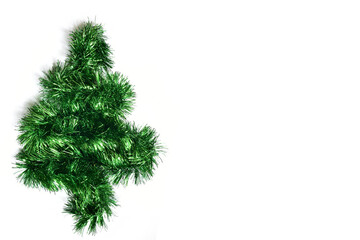 Green Christmas tree made of garlands on a white background. Holiday concept. Place for text