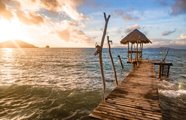 Wooden beach bar in sea and hut on pier in koh Mak island, Trat, Thailand