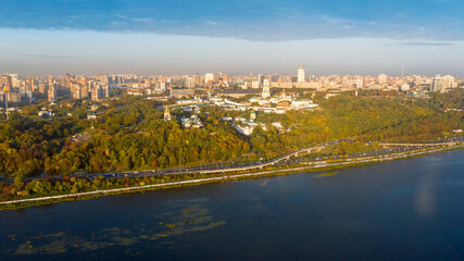Fototapeta na wymiar Beautiful autumn city of Kiev in the morning rays