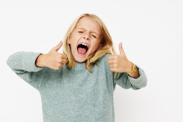 happy cute girl gestures with his hands kids lifestyle concept