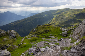 Amazing hiking day in one of the most beautiful area in Switzerland called Pizol in the canton of Saint Gallen. What a wonderful landscape in Switzerland at a sunny day. Beautiful alpine lake.