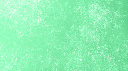 Green abstract grainy texture background.
