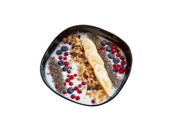 Overhead close up shot of Muesli with fruits in Bowl.