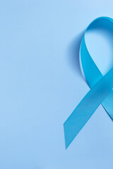 Blue ribbon on blue background symbol of world diabetes day