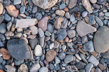 top view photo of pebbles and stones on the beach