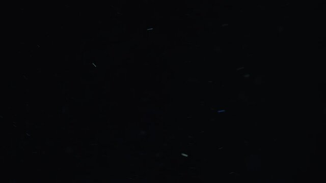 Natural Dust Organic Floating particles in stage light ray (spot) on black background. Dust in air atmosphere for your projects! Just drop it over your footage and use blending (screen) mode.