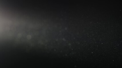 Natural Dust Organic Floating particles in stage light ray (spot) on black background. Dust in air atmosphere for your projects! Just drop it over your footage and use blending (screen) mode.