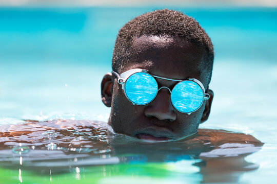 Black Man In Swimming Pool