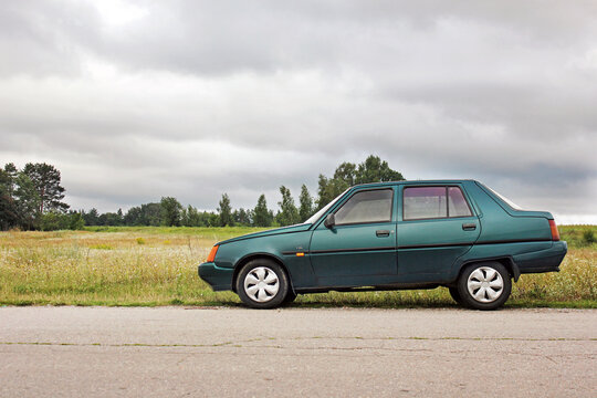 Chernigov, Ukraine - July 29, 2017: Budget car Zaz Slavuta on the road against the background of the field