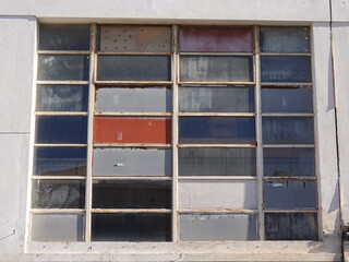Multicolored industrial windows in the town of La Ciotat in Provence.
