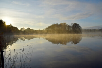Fototapeta premium autumn fog on the lake