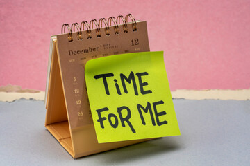 time for me reminder note on a desktop calendar, self care and personal development concept