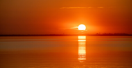Image of Beautiful view of the golden sunset sky over the ocean printed on Printed Glass Splashbacks
